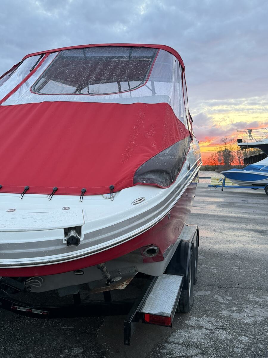 Front view of red custom canvas on a boat